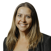 Professional headshot of Wendy Bluhm, a woman with brown hair and a warm smile